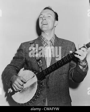 Pete Seeger (b. 1919) singing playing banjo.  He wrote many classic folk songs popularized in the 1960s, including “Where Have Stock Photo
