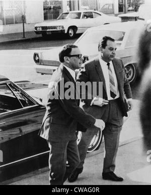 Frank Sinatra (1915-1998) and his attorney, Milton Rudin (right), on the street, arriving for court appearance in Las Vegas Stock Photo