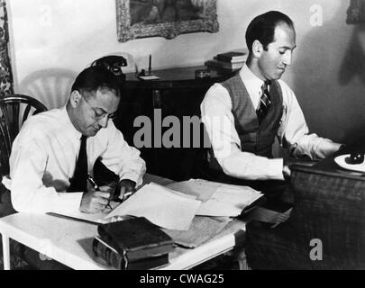 Ira and George Gershwin at work on a film score. ca. early 1930s. Courtesy: CSU Archives/Everett Collection. Stock Photo