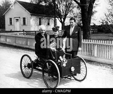 Henry Ford in his first automobile dated 1896. With him, wife Clara Bryant and grandson Henry Ford II, 1946. Courtesy: CSU Stock Photo
