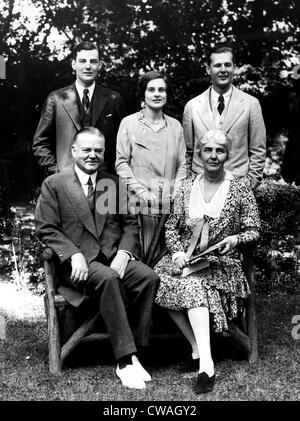 Herbert Hoover with his wife and family on the grounds of his home. Back row: Herbert Hoover jr, his wife Margaret and Allan Stock Photo