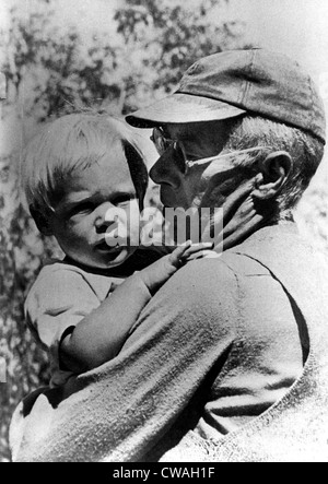 Henry Miller holding his son Tony, circa 1950. Courtesy: CSU Archives / Everett Collection Stock Photo