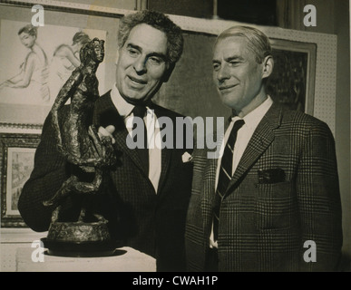 Willem de Kooning (1904-1997) examining a sculpture with Chaim Gross (1904-1991) in an art gallery in 1959.  Both American Stock Photo