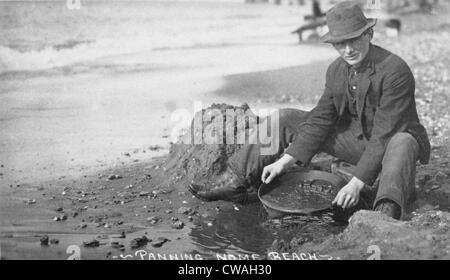 Man panning gold on Nome, Alaska beach in the early 20th century. Stock Photo