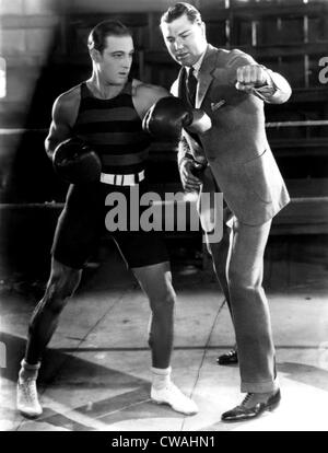 Ruldolph Valentino and heavyweight boxing champion Jack Dempsey at5 Valentino's studio in Hollywood. Ca. 1925. Courtesy: CSU Stock Photo