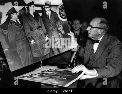 Joseph Welch examines doctored photo during McCarthy Hearings, April 27, 1954.. Courtesy: CSU Archives / Everett Collection Stock Photo