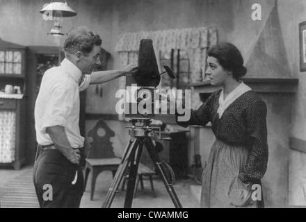 Alla Nazimova, (1879-1945), Ukrainian born American actress with director Herbert Brenon (1880-1958) talking near a movie Stock Photo