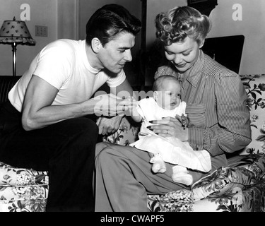 Ronald Reagan, Maureen Reagan, Jane Wyman at home, 4/26/41. Courtesy: CSU Archives / Everett Collection Stock Photo