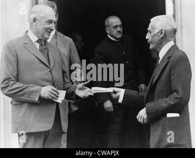 Warren G. Harding (1865-1923), buys treasury savings certificates from Secretary of the Treasury, Andrew Mellon.  The long term Stock Photo