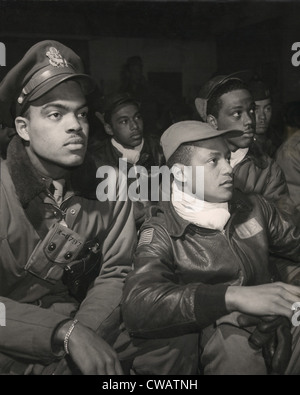 Tuskegee airmen of the 332nd Fighter Group attending a briefing in Ramitelli, Italy, March, 1945. Left to right: Robert W. Stock Photo