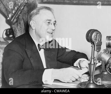 President Franklin D. Roosevelt (1882-1945), delivering a radio address on unemployment during the Great Depression.  His