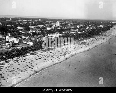 A view of the beach at Miami, Florida showing thousands of bathers enjoying the sun. 3/2/34. Courtesy: CSU Archives/Everett Stock Photo