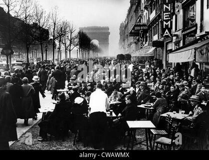 Easter Monday on the Champs Elysees with customers at Apertif hour. 4/10/34. Courtesy: CSU Archives/Everett Collection. Stock Photo