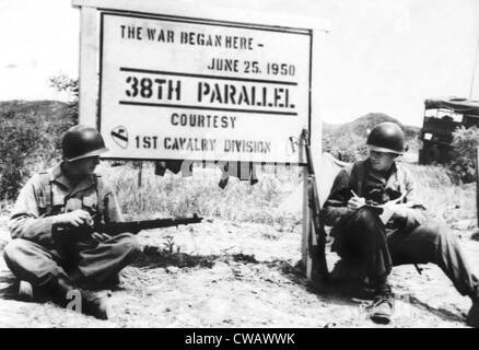 Korean War, soldiers resting on the spot where the Korean War broke out, (pictured: Pvt. Fred Furhaman, Pvt. Daniel M. Stock Photo
