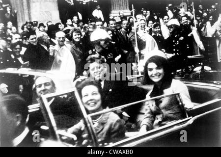 John F. Kennedy motorcade, Dallas, Texas. Photograph shows a close-up view of President and Mrs. Kennedy and Texas Governor Stock Photo