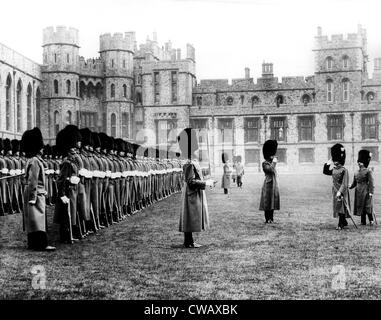 The 1st Battalion Welsh Guards recieve a salute from the Prince of Wales during an inspection at Windsor Castle on Saint Stock Photo