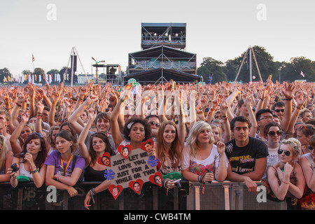 The crowd enjoying the live music at V Festival in Hylands Park, Chelmsford, Essex Stock Photo