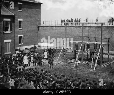 The assassination of President Abraham Lincoln, hanging hooded bodies of the four conspirators, (Mary E. Surratt, Lewis Payne, Stock Photo