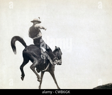 Bucking Bronco. Ned Coy, a famous Dakota cowboy, on a bucking horse. Photograph by John C. Grabill  ca. 1888 Stock Photo