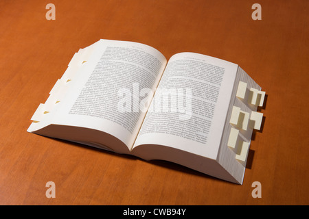 a book with many yellow reminders Stock Photo