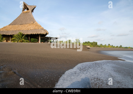 The Marina Puesta del Sol with its beachside palapa & pool is the top resort on the beautiful Pacific coast of Nicaragua. Stock Photo