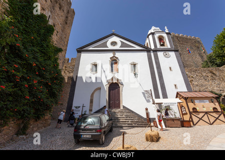 Santiago Church and Albarrã Castle Tower. Óbidos, Portugal Stock Photo