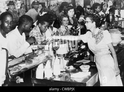 African American being served at Kress Store restaurant  after a successful two-day sit-in broke racial discrimination in Stock Photo
