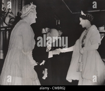 Prime Minister Winston Churchill and Lady Churchill bows to Queen Elizabeth as she arrives at his retirement dinner in London, Stock Photo