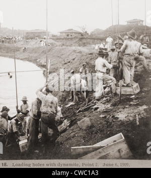 Panama Canal construction showing workers loading holes with dynamite, at Point 2 on June 6, 1909. Note the name of the Stock Photo