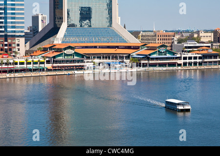 Jacksonville Landing at the base of the Wells Fargo Center skyscraper along St. Johns River in downtown Jacksonville, FL Stock Photo