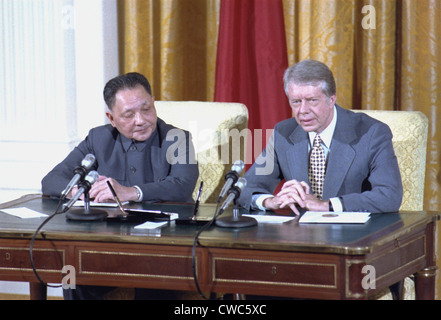 Chinese Vice Premier Deng Xiaoping and US President Jimmy Carter sign diplomatic agreements promoting scientific technological Stock Photo