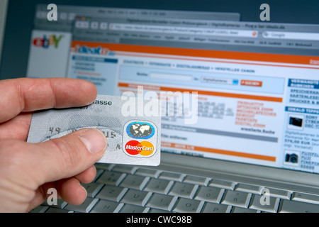 Banking and credit card payment via computer Stock Photo