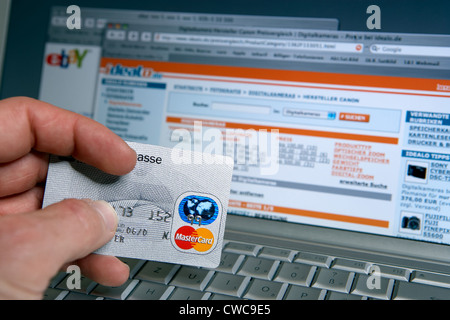 Banking and credit card payment via computer Stock Photo