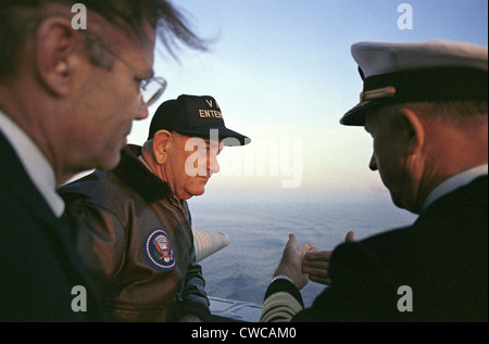 President Lyndon Johnson's tours of the USS Enterprise. Secretary of Defense and LBJ during a Veteran's Day visit to the Stock Photo