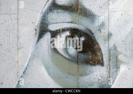 Detail of a graffiti painted on a concrete wall. Stock Photo