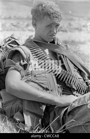 Vietnam War. US Marine takes a break during a ground movement 25 miles north of An Hoa, North Vietnam. 1969. Stock Photo