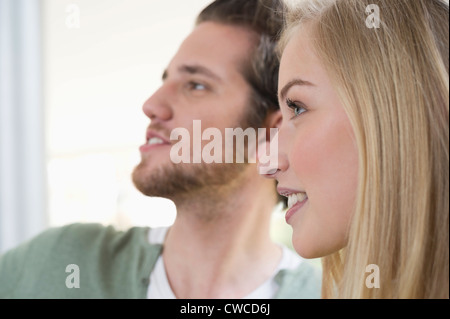 Close-up of a woman with a man beside her Stock Photo