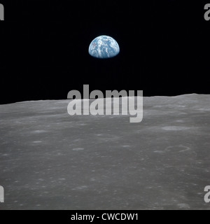 Apollo 11 Earth rise over the Moon. Earth on the horizon in the Mare Smythii Region of the Moon. Image 11 of a NASA sequence of Stock Photo