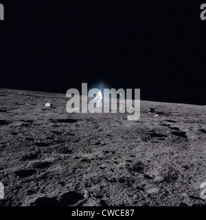 Apollo 12 Astronaut Alan Bean deploys scientific experiments on the lunar surface. Nov. 19, 1969. Stock Photo