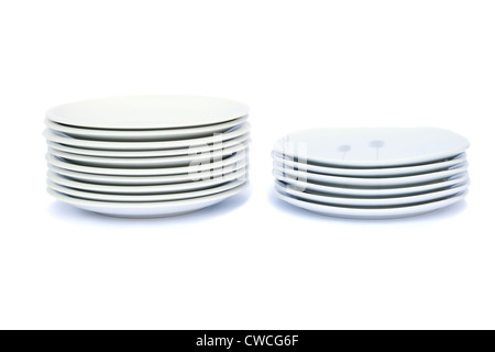 a stack of white plates isolated on white background with clipping path ...