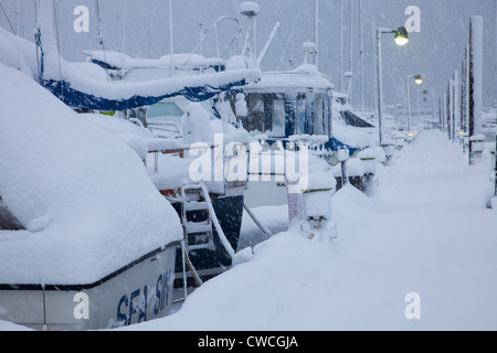 The small boat harbor during a winter storm, Seward, Alaska. Stock Photo