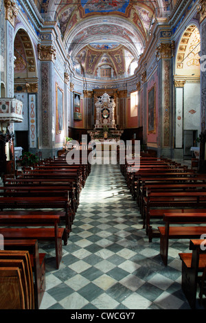 Church in Finalpia: Chiesa abbaziale benedettina 'Nostra Signora Assunta' di Finale Ligure Pia con campanile secolo XII Stock Photo