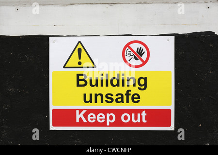 Unsafe building warning sign Stock Photo