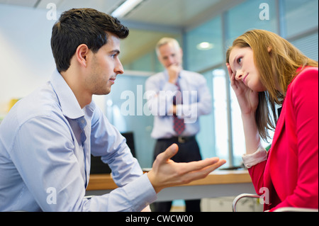 Business executives discussing in an office Stock Photo