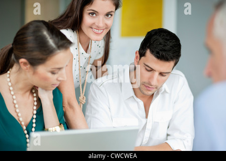 Business executives working in an office Stock Photo