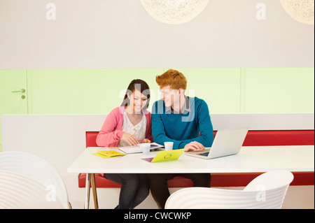 Business couple working in an office Stock Photo