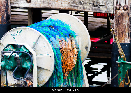 Reel holding fishing net on fishing boat in 'Santa Barbara' harbor. Stock Photo