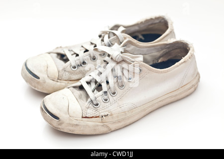 Old sport shoes on white background Stock Photo