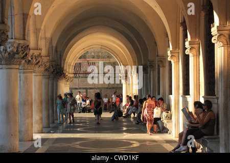 Colonnaded arcade of Palazzo Ducale (Doge's Palace), San Marco, Venice Italy Stock Photo