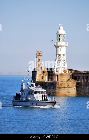 The Royal Navy Patrol Boat HMS Archer enters Dover harbour in Kent during August 2012. Stock Photo